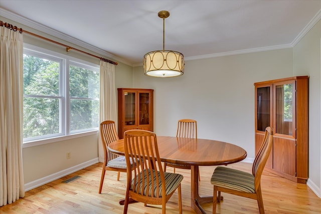 802 Dunbarton Dr, North Augusta, SC 29841 - dining area with plenty of natural light, light wood-style flooring, and ornamental molding