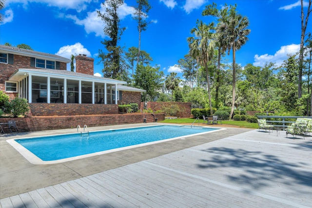 802 Dunbarton Dr, North Augusta, SC 29841 - view of swimming pool with a sunroom and a patio area