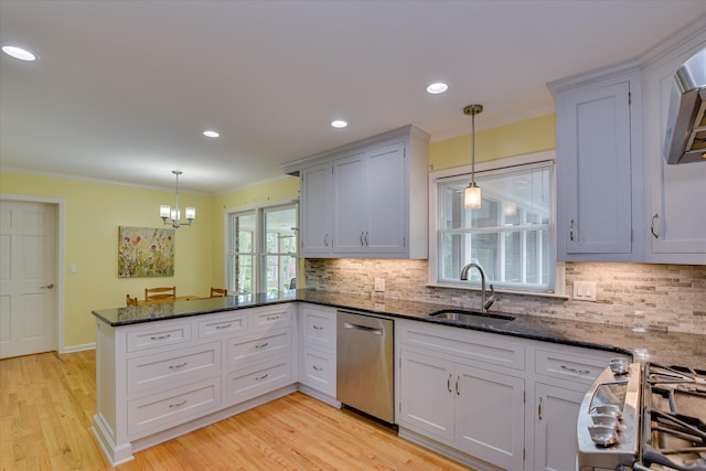 802 Dunbarton Dr, North Augusta, SC 29841 - kitchen featuring stainless steel dishwasher, a peninsula, ornamental molding, range, and decorative backsplash