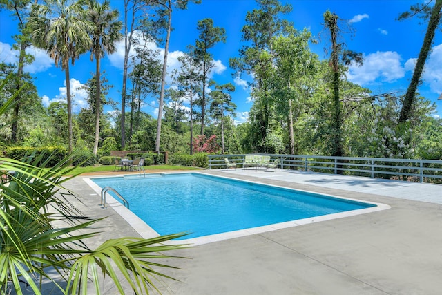 802 Dunbarton Dr, North Augusta, SC 29841 - view of pool featuring a patio and view of scattered trees