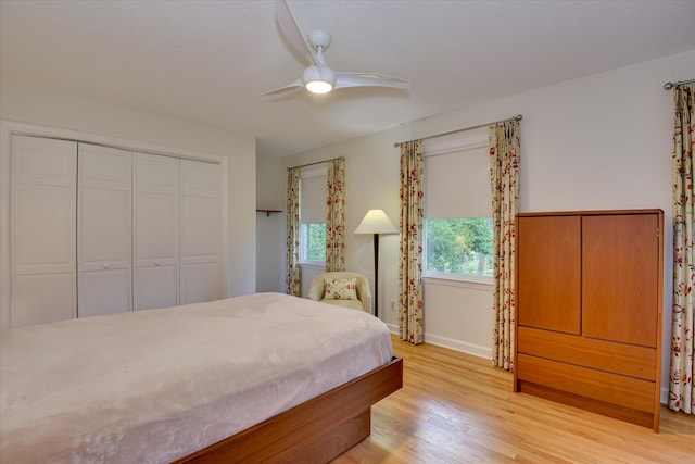 802 Dunbarton Dr, North Augusta, SC 29841 - bedroom with light wood finished floors, a closet, and a ceiling fan