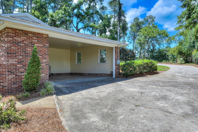 802 Dunbarton Dr, North Augusta, SC 29841 - view of property exterior featuring concrete driveway, an attached carport, and brick siding