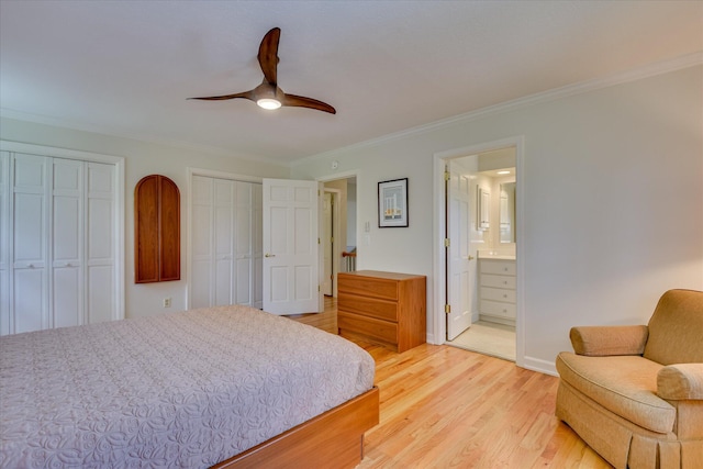 802 Dunbarton Dr, North Augusta, SC 29841 - bedroom with multiple closets, ornamental molding, light wood-type flooring, connected bathroom, and ceiling fan
