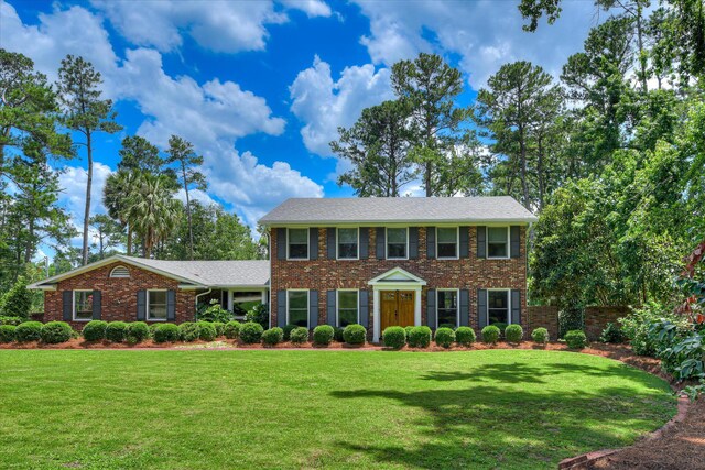 802 Dunbarton Dr, North Augusta, SC 29841 - colonial house featuring brick siding and a front lawn