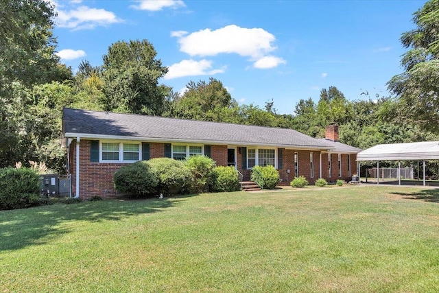 single story home featuring a front yard and a carport