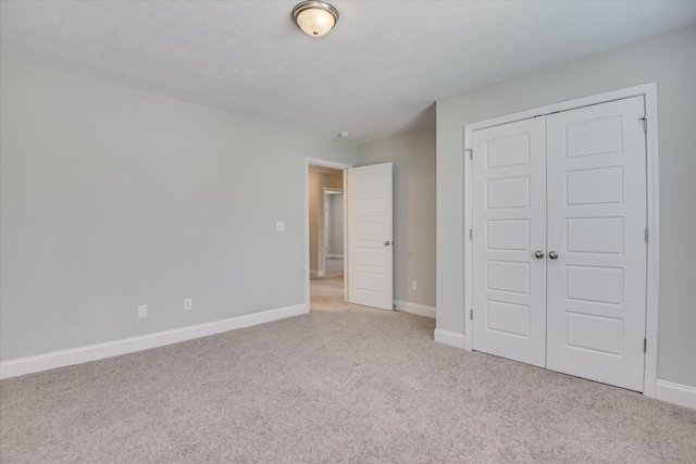 5816 Whispering Pines Way, Evans, GA 30809 - unfurnished bedroom featuring carpet flooring, a closet, and baseboards
