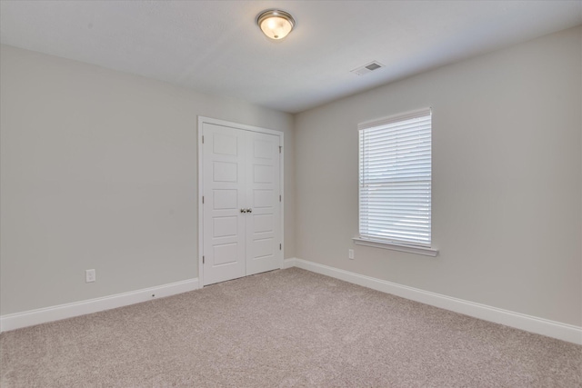 5816 Whispering Pines Way, Evans, GA 30809 - spare room with light colored carpet and baseboards