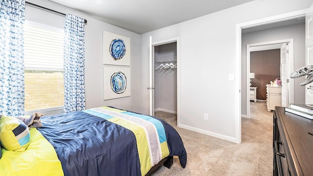 carpeted bedroom with a closet