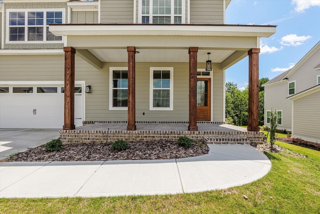 831 Whitney Shoals Rd, Evans, GA 30809 - entrance to property with a porch, driveway, and an attached garage