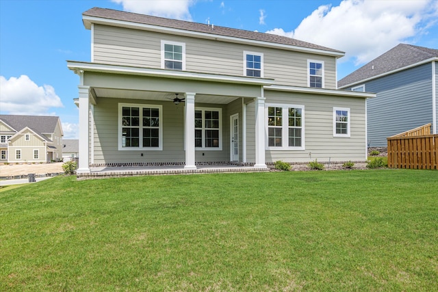 831 Whitney Shoals Rd, Evans, GA 30809 - rear view of house featuring ceiling fan, a lawn, and a porch