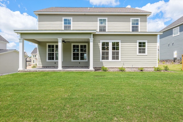 831 Whitney Shoals Rd, Evans, GA 30809 - back of property with a ceiling fan, a yard, and a patio area