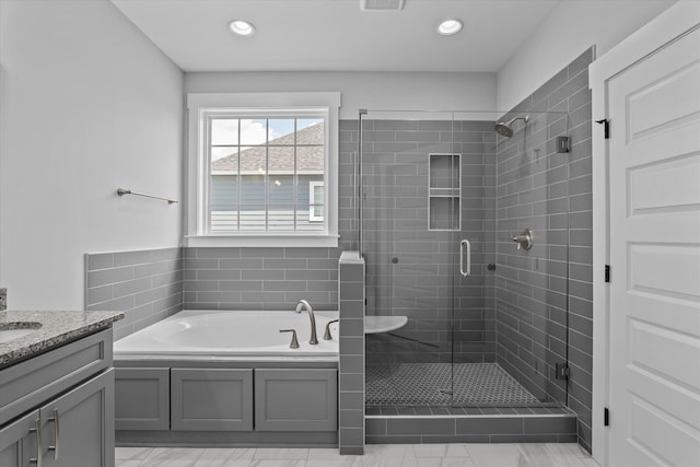 831 Whitney Shoals Rd, Evans, GA 30809 - bathroom featuring a garden tub, a shower stall, vanity, and recessed lighting