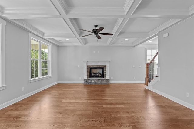 831 Whitney Shoals Rd, Evans, GA 30809 - unfurnished living room featuring ceiling fan, wood finished floors, stairs, a fireplace, and beamed ceiling