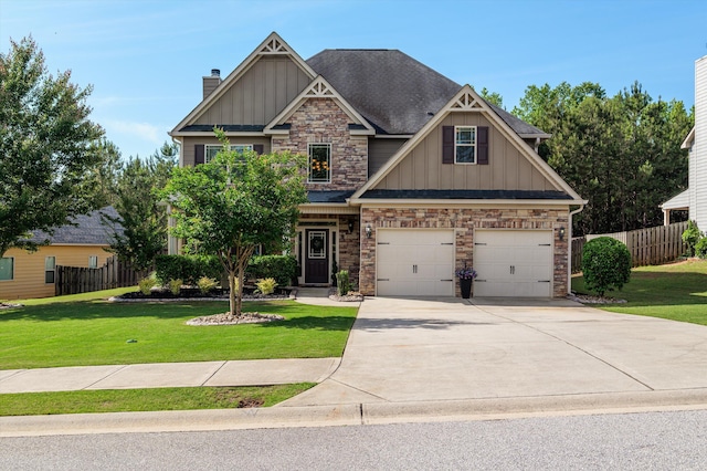 craftsman-style house featuring board and batten siding, stone siding, concrete driveway, and a garage