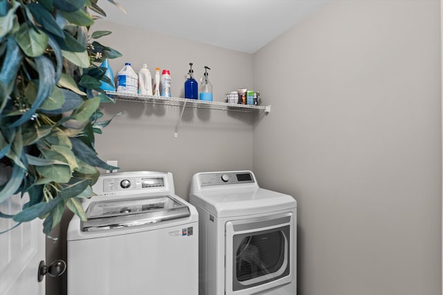 laundry area with washer and dryer