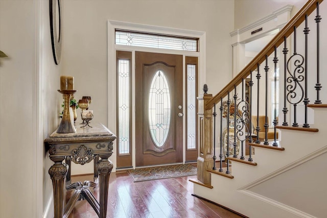 entrance foyer with hardwood / wood-style flooring