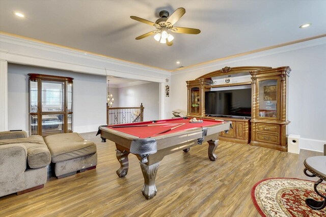 rec room with hardwood / wood-style flooring, ceiling fan, crown molding, and billiards