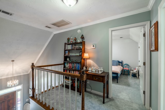 office area featuring a textured ceiling, carpet, an inviting chandelier, vaulted ceiling, and crown molding