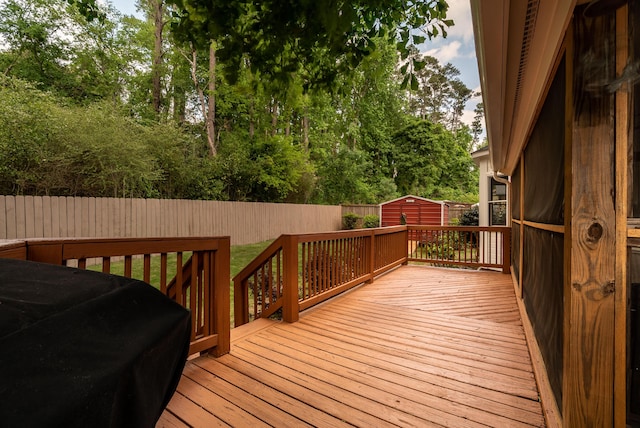 deck with a storage shed