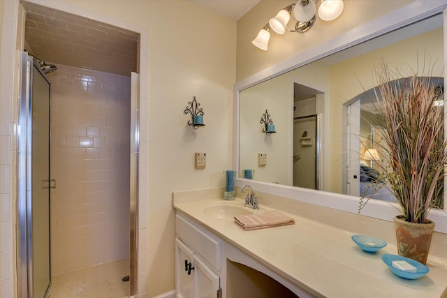 bathroom with vanity and walk in shower