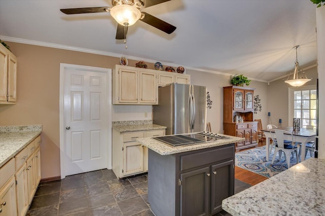 kitchen with stainless steel fridge, black electric stovetop, crown molding, a kitchen island, and pendant lighting