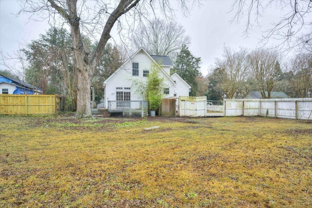 view of yard featuring a wooden deck