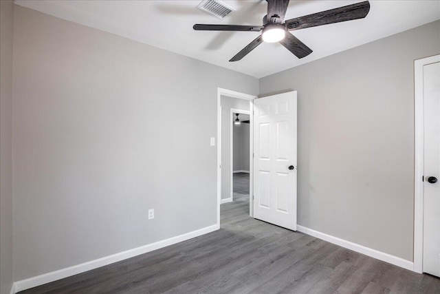 unfurnished bedroom with hardwood / wood-style flooring and ceiling fan