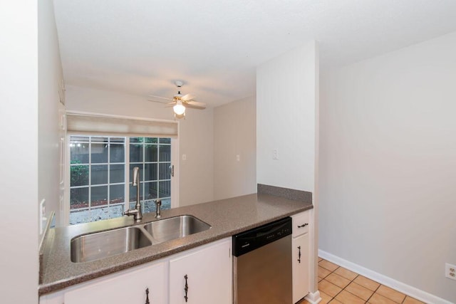 kitchen with ceiling fan, white cabinetry, dishwasher, sink, and light tile patterned floors