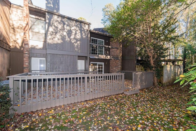 rear view of house with a balcony