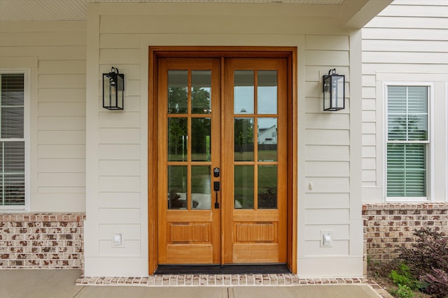 552 River Oaks Ln, Evans, GA 30809 - doorway to property with french doors and covered porch