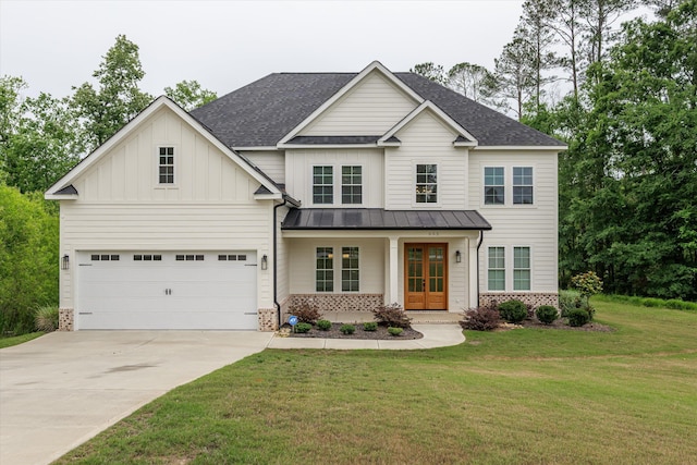 552 River Oaks Ln, Evans, GA 30809 - view of front of home featuring french doors, a standing seam roof, driveway, a front yard, and a shingled roof