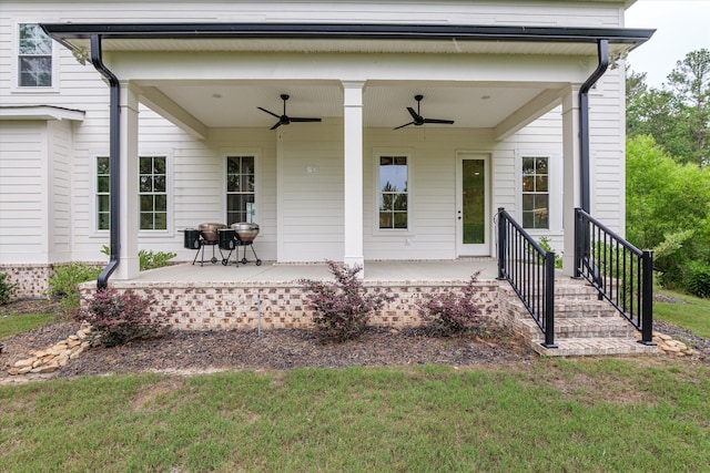 552 River Oaks Ln, Evans, GA 30809 - rear view of house featuring a ceiling fan, a lawn, and a patio
