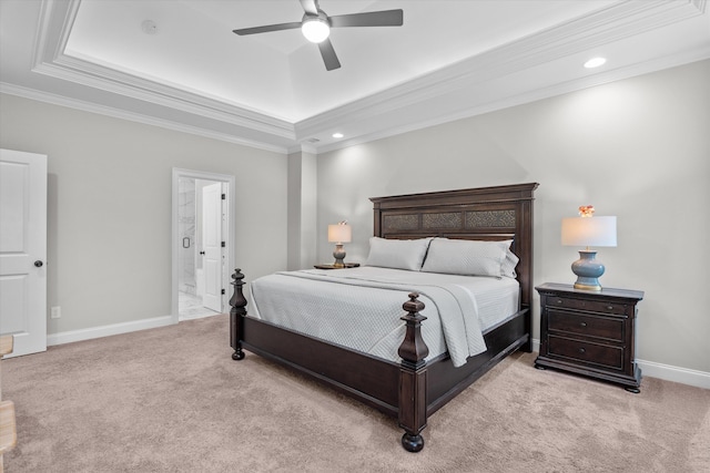 552 River Oaks Ln, Evans, GA 30809 - bedroom with a raised ceiling, light colored carpet, crown molding, baseboards, and connected bathroom