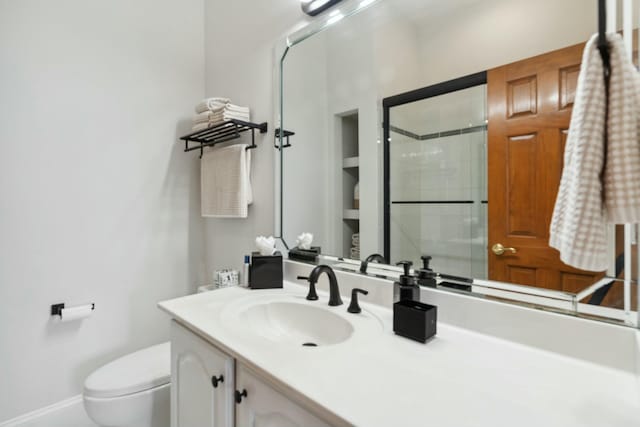 29 Savannah River Pl, North Augusta, SC 29841 - bathroom featuring vanity, toilet, baseboards, and a stall shower