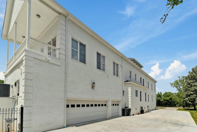 29 Savannah River Pl, North Augusta, SC 29841 - exterior space with brick siding, an attached garage, driveway, and a balcony
