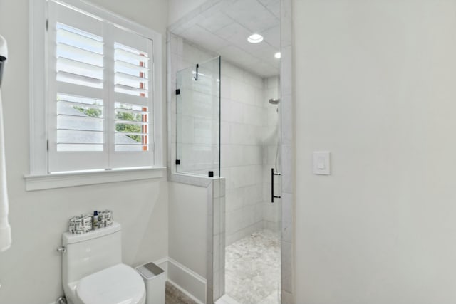 29 Savannah River Pl, North Augusta, SC 29841 - bathroom with baseboards, toilet, and a shower stall