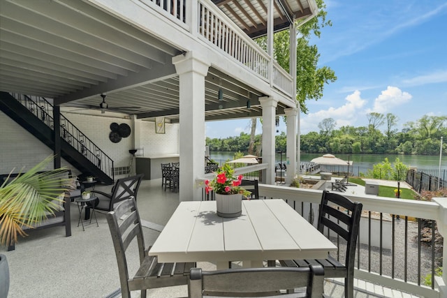 29 Savannah River Pl, North Augusta, SC 29841 - view of patio featuring outdoor dining area, a water view, and ceiling fan