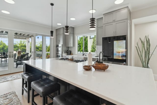 29 Savannah River Pl, North Augusta, SC 29841 - kitchen with a large island with sink, a sink, appliances with stainless steel finishes, and gray cabinetry