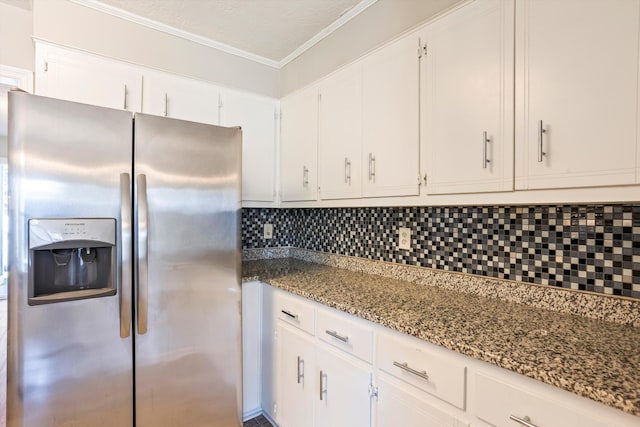 661 Kemper Dr, Evans, GA 30809 - kitchen with stainless steel fridge with ice dispenser, white cabinetry, tasteful backsplash, stone countertops, and crown molding