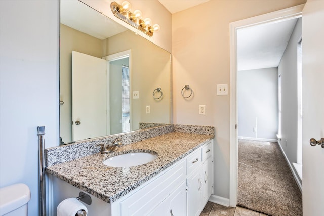 661 Kemper Dr, Evans, GA 30809 - bathroom featuring vanity and baseboards