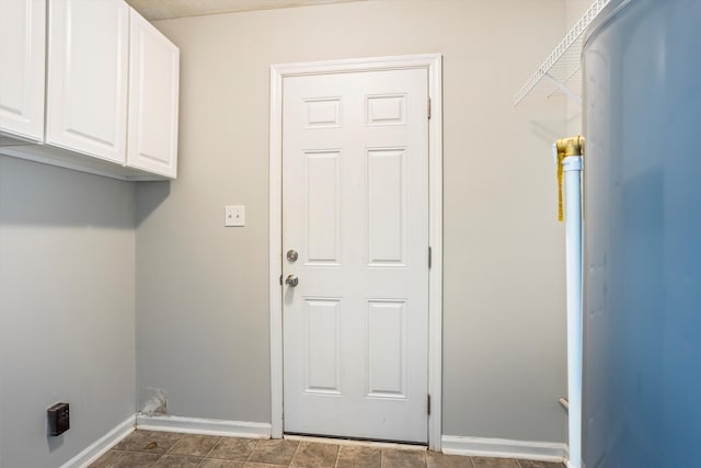 661 Kemper Dr, Evans, GA 30809 - laundry room with baseboards and cabinet space