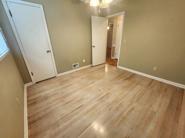 2023 Pisgah Rd, North Augusta, SC 29841 - unfurnished bedroom featuring light wood-style floors and baseboards