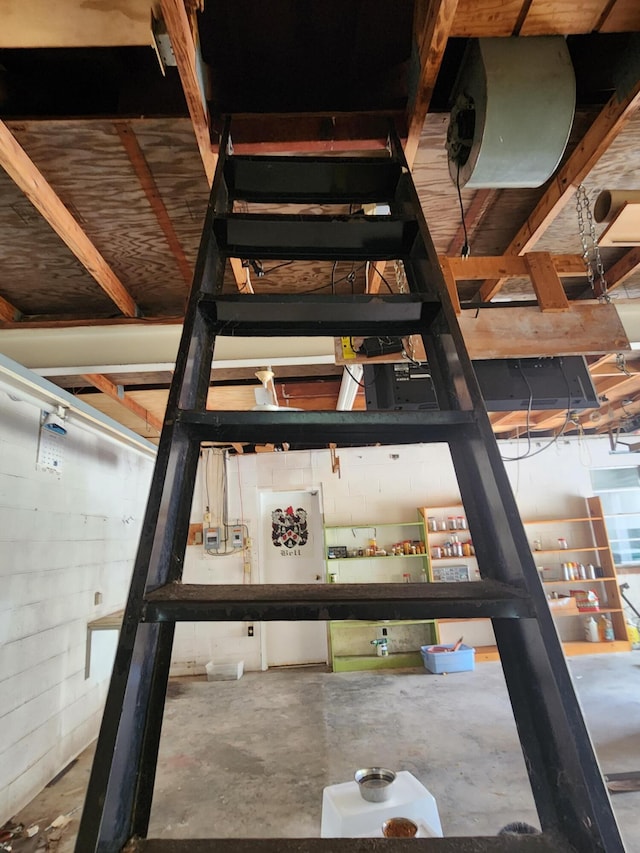 2023 Pisgah Rd, North Augusta, SC 29841 - stairs with concrete flooring and concrete block wall