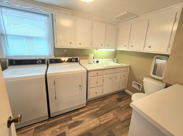 2023 Pisgah Rd, North Augusta, SC 29841 - laundry room with washer and clothes dryer, dark wood finished floors, and a textured ceiling