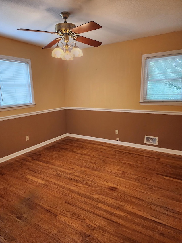 2023 Pisgah Rd, North Augusta, SC 29841 - spare room with plenty of natural light, wood finished floors, and a ceiling fan