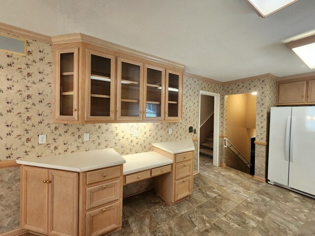 2023 Pisgah Rd, North Augusta, SC 29841 - kitchen with freestanding refrigerator, wallpapered walls, glass insert cabinets, light countertops, and crown molding