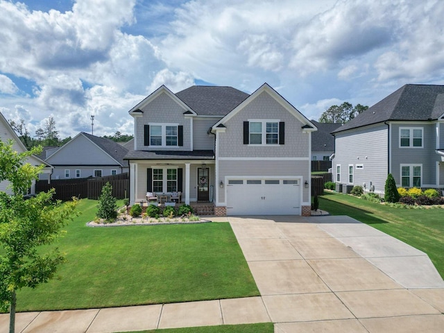 719 Nuttall St, Evans, GA 30809 - craftsman-style house with covered porch, driveway, an attached garage, brick siding, and roof with shingles