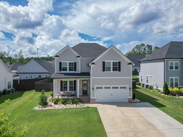 719 Nuttall St, Evans, GA 30809 - craftsman house featuring an attached garage, concrete driveway, covered porch, and brick siding