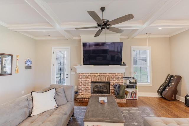 719 Nuttall St, Evans, GA 30809 - living area with coffered ceiling, beam ceiling, plenty of natural light, dark wood-style floors, and ceiling fan