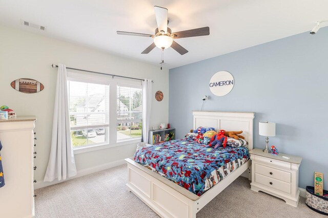 719 Nuttall St, Evans, GA 30809 - bedroom featuring light carpet and ceiling fan